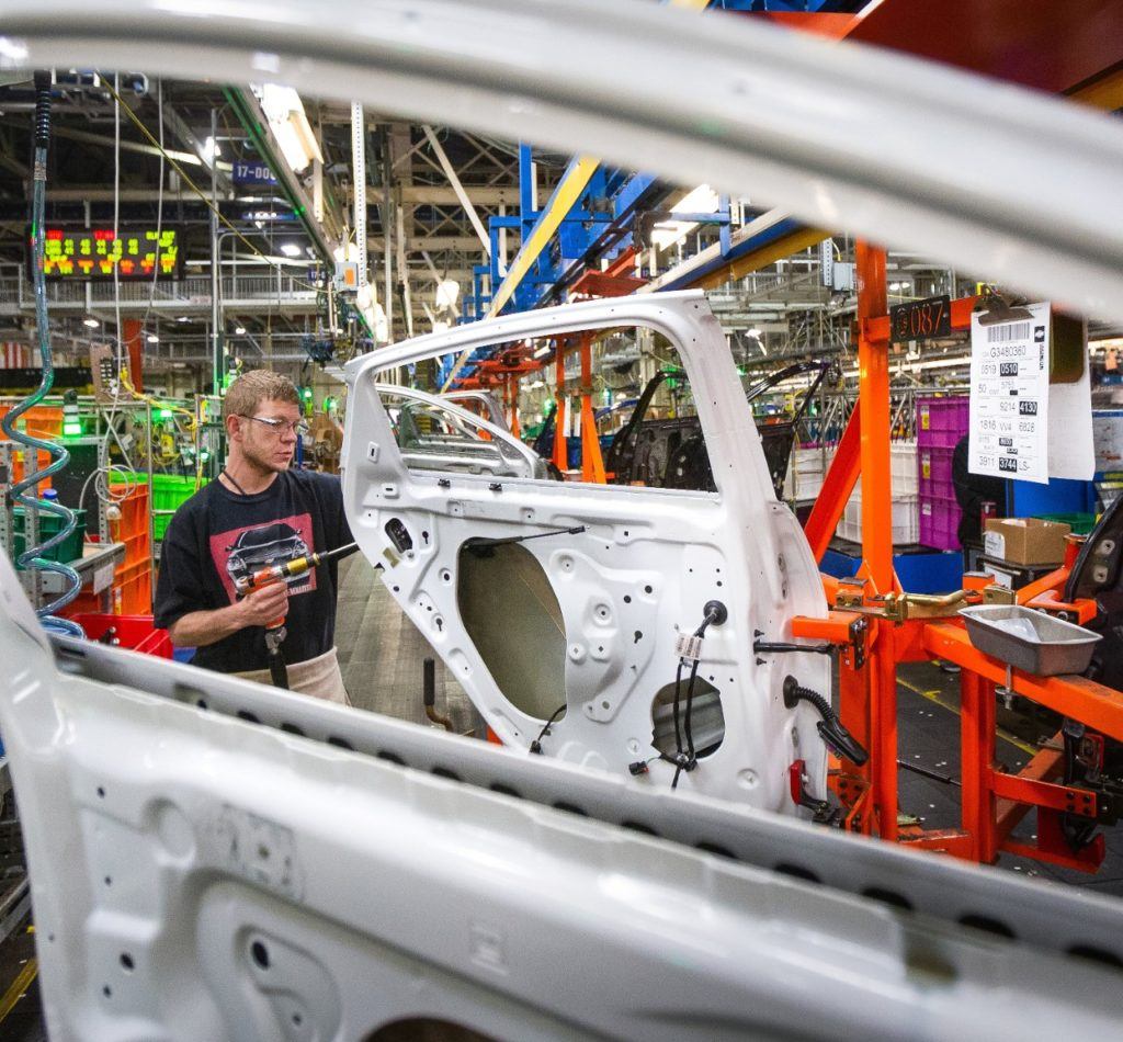 A General Motors employee works on the assembly line Friday, April 26th, 2019 at Fairfax Assembly & Stamping Plant in Kansas City, Kansas. The Fairfax facility produces the Cadillac XT4 and Chevrolet Malibu. GM is suspending manufacturing operations in North America due to market conditions and to deep clean facilities in response to the Coronavirus. Photo: General Motors. 